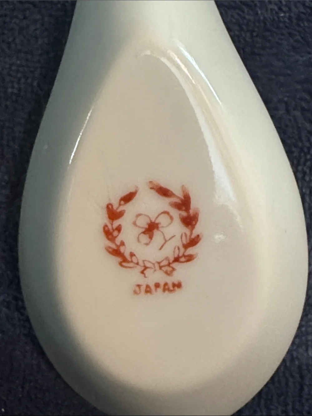 Ceramic Asian Soup Spoon with Floral Motif - White